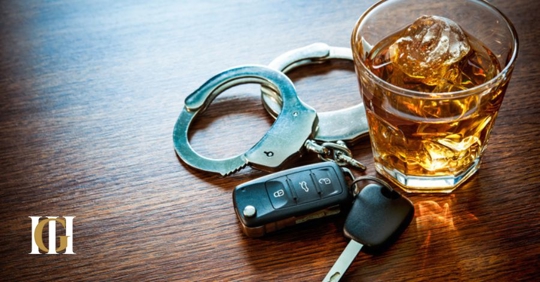 car keys, handcuffs, and liquor